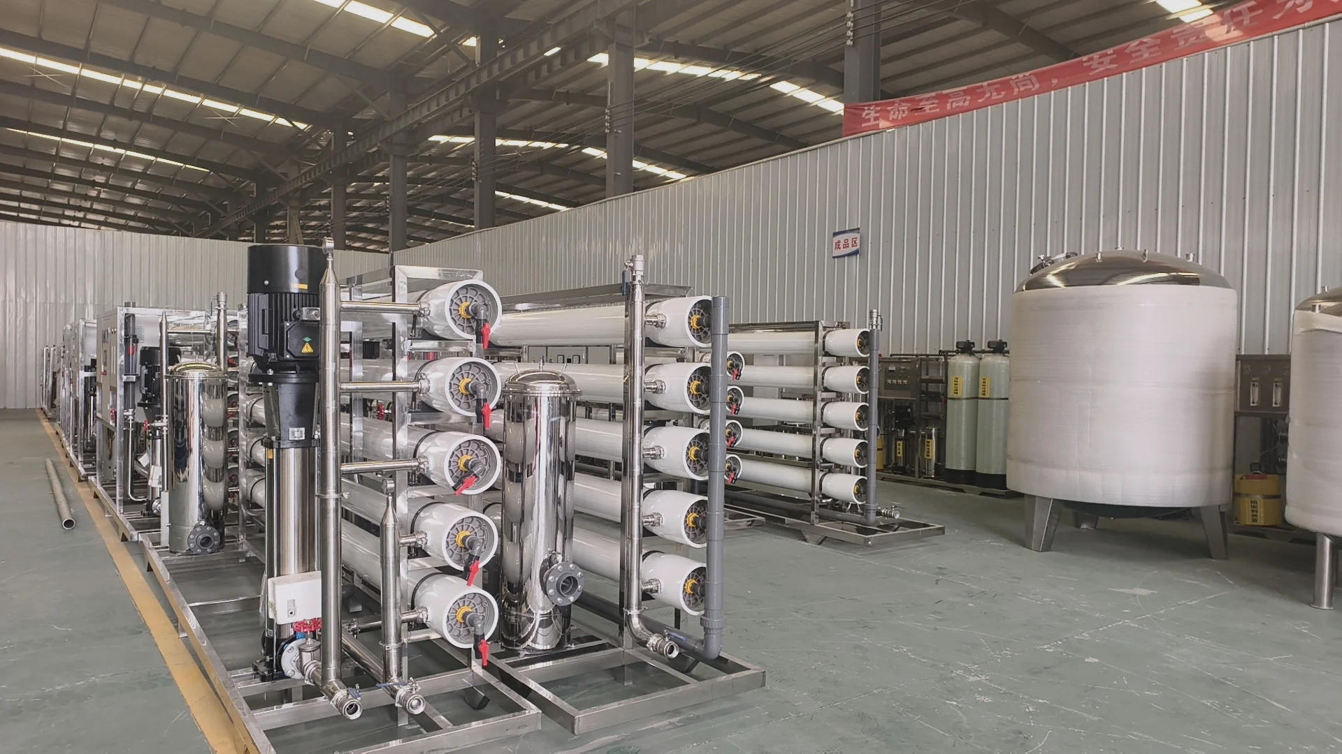 Engineers checking a Xinnuo water treatment skid